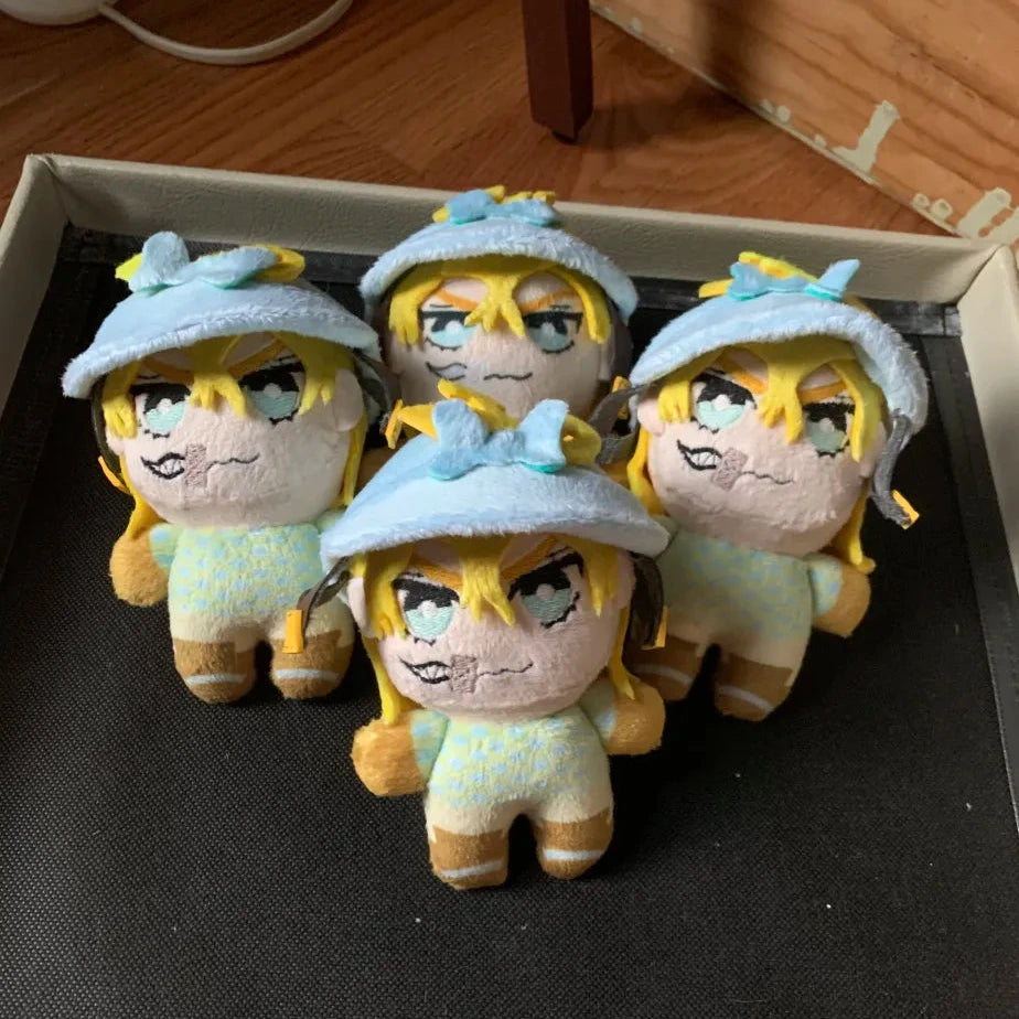 Four identical small plush toys with blonde hair and blue hats on a black surface.